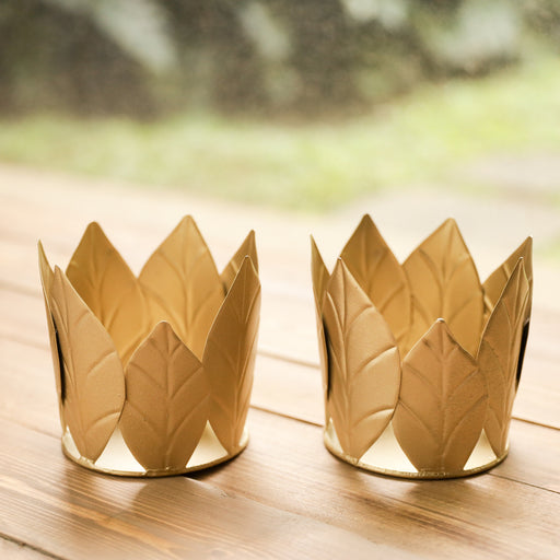 For a festive and subtle candlelight display this holiday season, the Jimena Candle Votive Holder is a great addition to your dining table décor. Each candle votive holder has meticulously cut leaves welded together by our master artisans.
