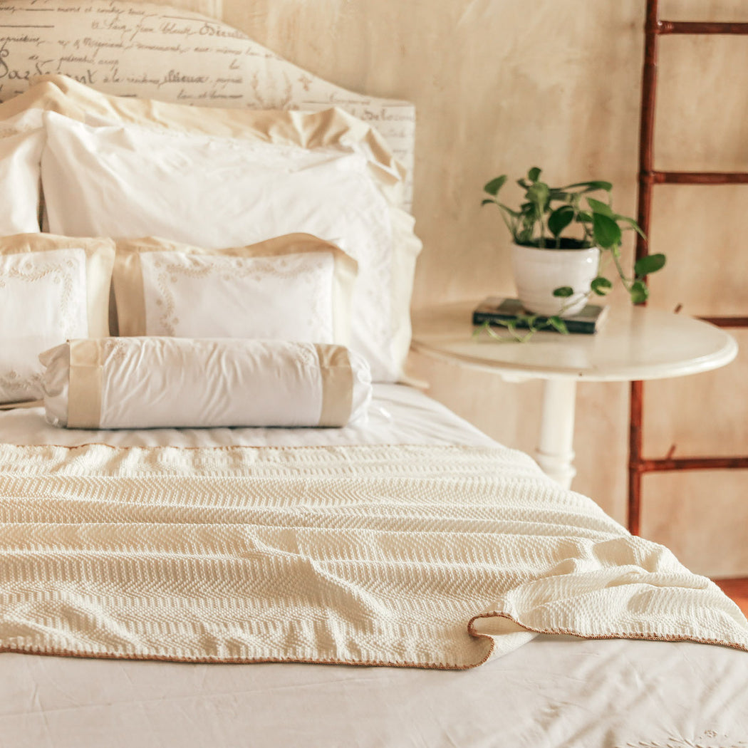 Add a cozy layer of warmth to your bed in a variety of earthy neutral tones. Made from hand-loomed polyester cotton. Each bedspread is adorned with meticulously hand-crocheted trimmings. Lovingly made in the Philippines.