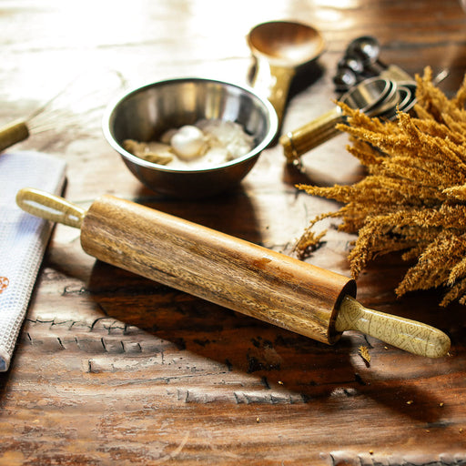 Roll with ease and style using this beautifully crafted wooden rolling pin with signature handles. The size and weight are perfect for working on all kinds of bread, pasta, and cookie doughs! Lovingly made in the Philippines. Home decor and baking essentials available online through Domesticity.