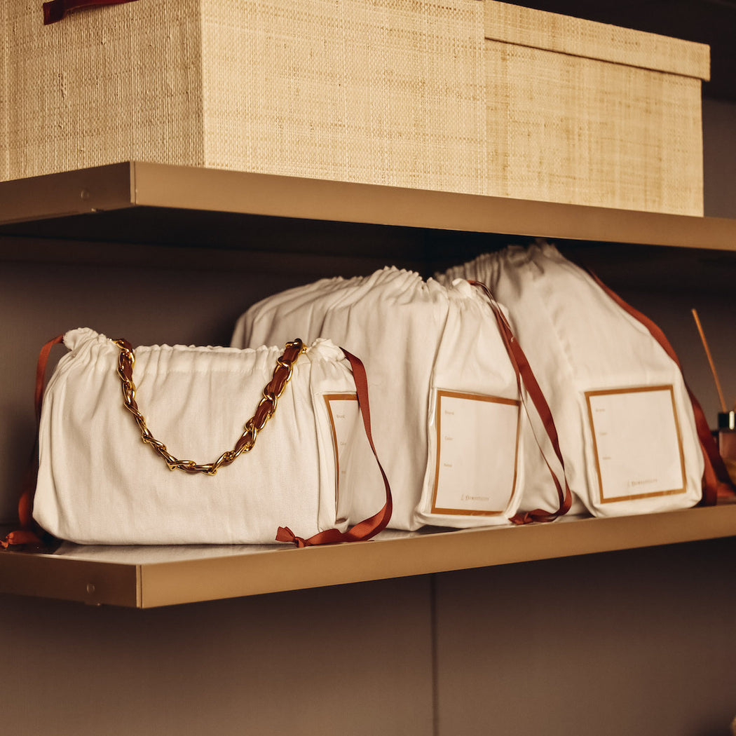 The perfect solution to protect and keep your handbags looking their best. Made from lightweight canvas material, each comes with a label that helps you identify your handbags. No more dull or generic storage pieces. Create a clutter-free space by using any of our multi-purpose boxes and bins. Available online at Domesticity.