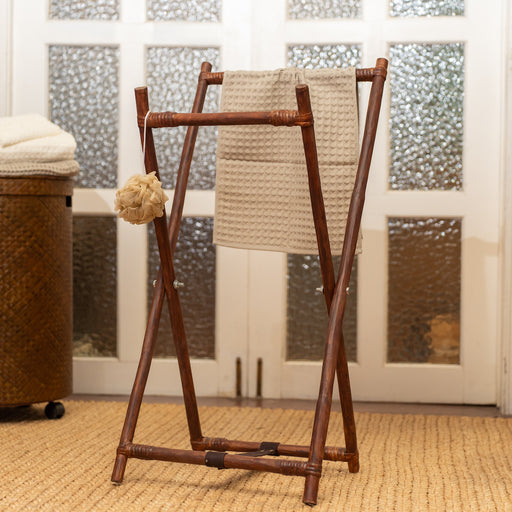 The Soraya Rattan Standing Towel Rack provides maximum space to store and dry your wet towel after a long hot bath. This foldable rack is a space-saving solution for limited bathroom spaces. Handcrafted in the Philippines from rattan material. 