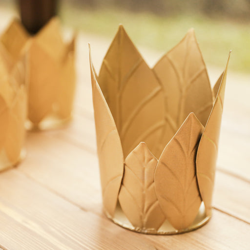 For a festive and subtle candlelight display this holiday season, the Jimena Candle Votive Holder is a great addition to your dining table décor. Place on side tables or shelves for added décor. Each candle votive holder has meticulously cut leaves welded together by our master artisans.