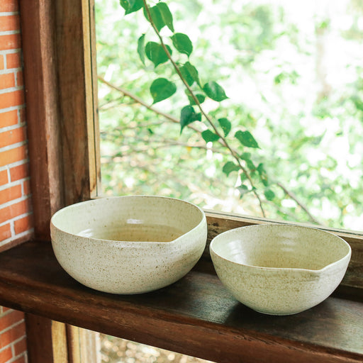 The organic stoneware bowls you absolutely need in your life. Crafted in a timeless design with natural speckles, these locally handmade bowls are both functional pieces and a work of art. They can be used to mix your loaf of homemade bread, to pour your cake batter with ease into molds with the help of the useful spouts, or to serve a beautiful Sunday family dinner. Lovingly made in the Philippines. Home decor and baking essentials available online through Domesticity.