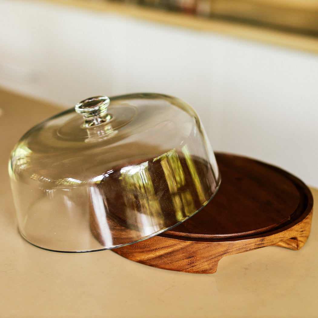 We designed a sister-dome to match the cake stand, and to give your table setting extra layers to work with. This grounded version is great for pies, tarts, pastries and an impressive cold cuts platter. Lovingly made in the Philippines. Home decor and baking essentials available online through Domesticity.