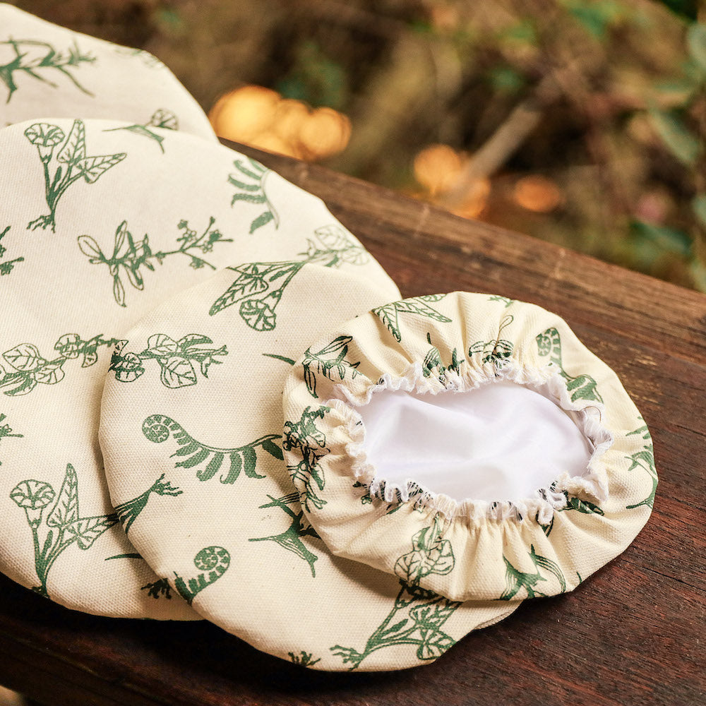 Match these farmhouse-chic mitts with your linen apron to complete the look! Not just stylish but completely functional, these oven mitts are thick and sturdy enough to handle the hottest of pans with a lengthy design to keep your wrists protected from oven burns. Donned with the intricately embroidered adlai plant in the corner to add some country charm. Lovingly made in the Philippines. Baking essentials available online through Domesticity.