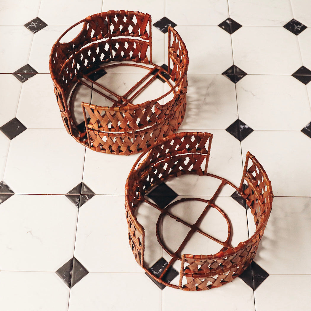 Keeps your plates organized and protected while entertaining alfresco. Made from wrought iron material wrapped and braided with pandan strips. Dining table accessories available online through Domesticity in the Philippines.