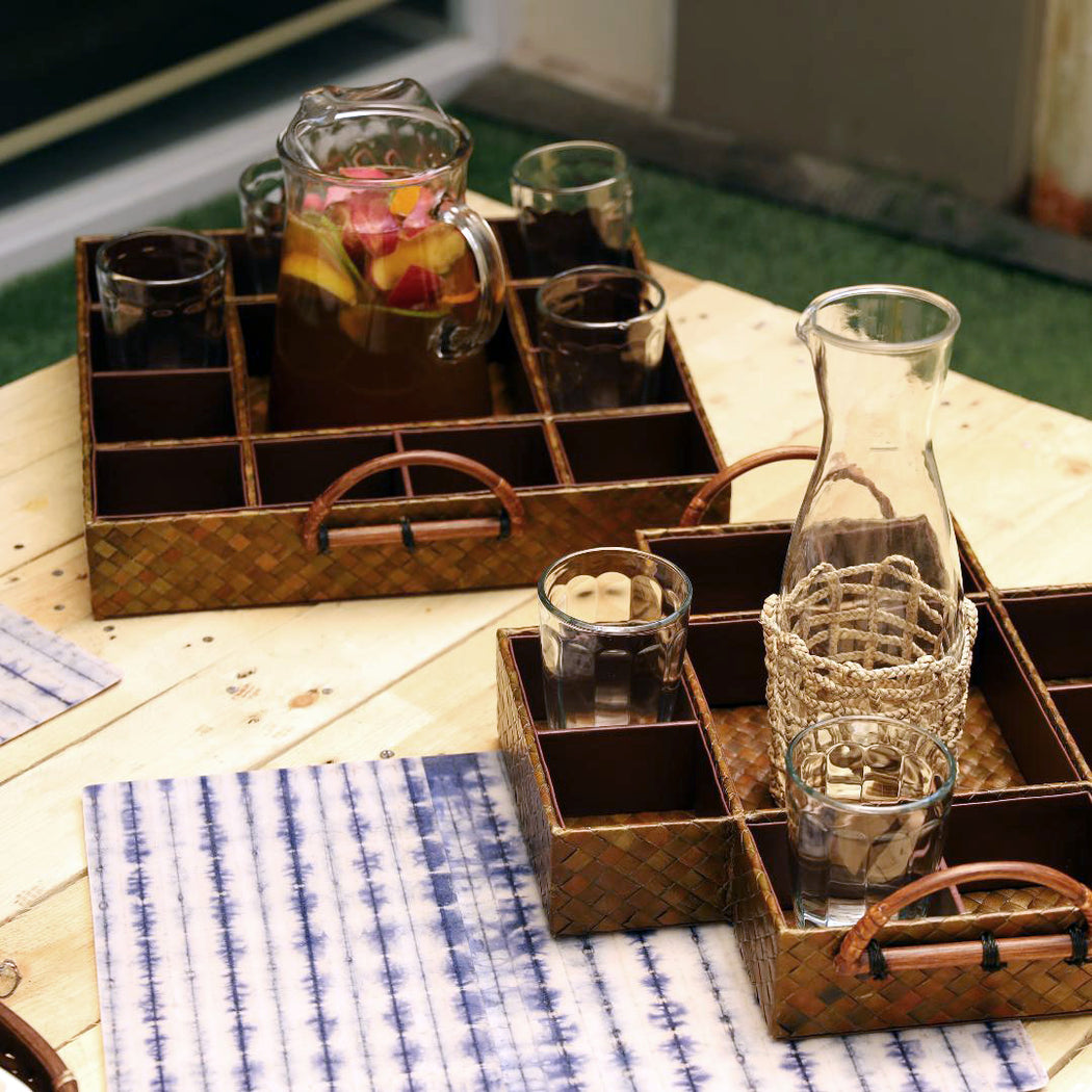 Handmade by our Gawad Kalinga beneficiaries, our tray keeps your pitcher and drinking glasses in place while transferring from place to place. Dining accessory you can use for indoors and outdoors. Lovingly made in the Philippines and available online.